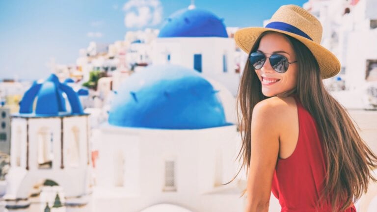 Beautiful woman traveler smiling in her Favorite Vacation Spots