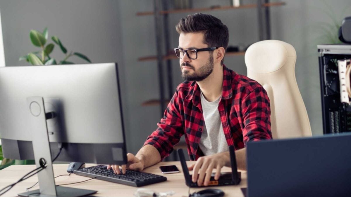 Man working in desktop computer