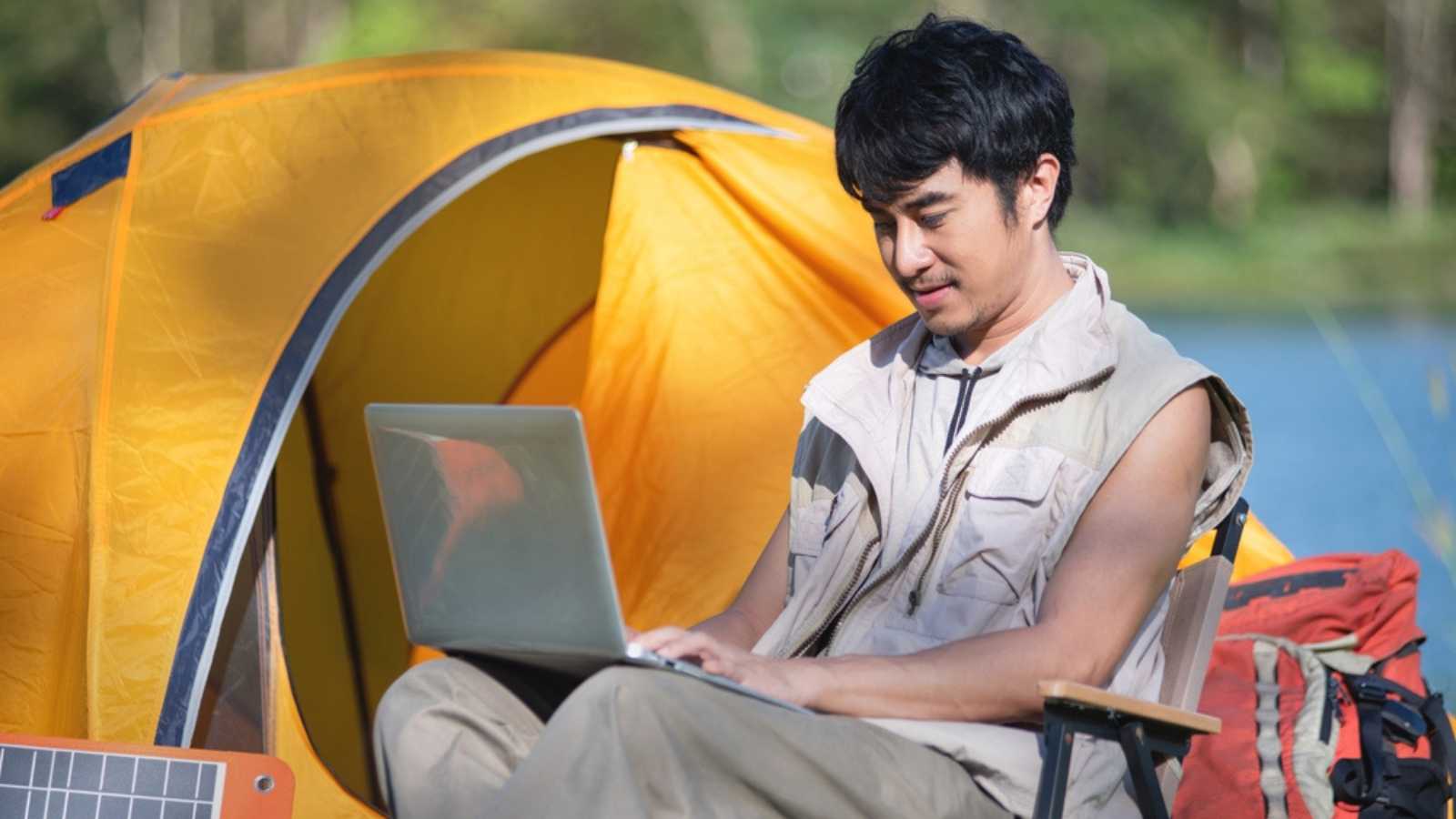Man working near tent
