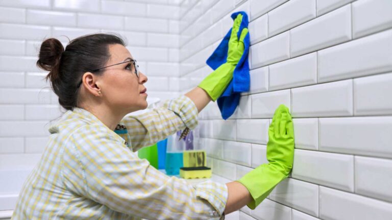 Woman cleaning with rags
