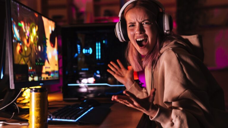 Woman gamer irritated (Games That Are So Terrible)