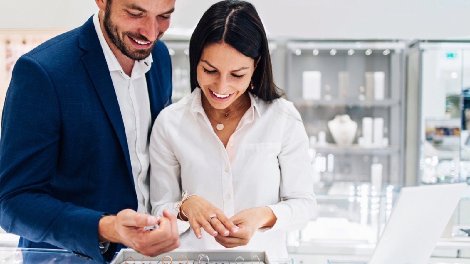 Beautiful couple chosing jewelry