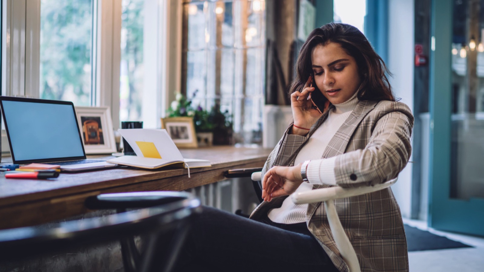 Beautiful girl working talking in mobile