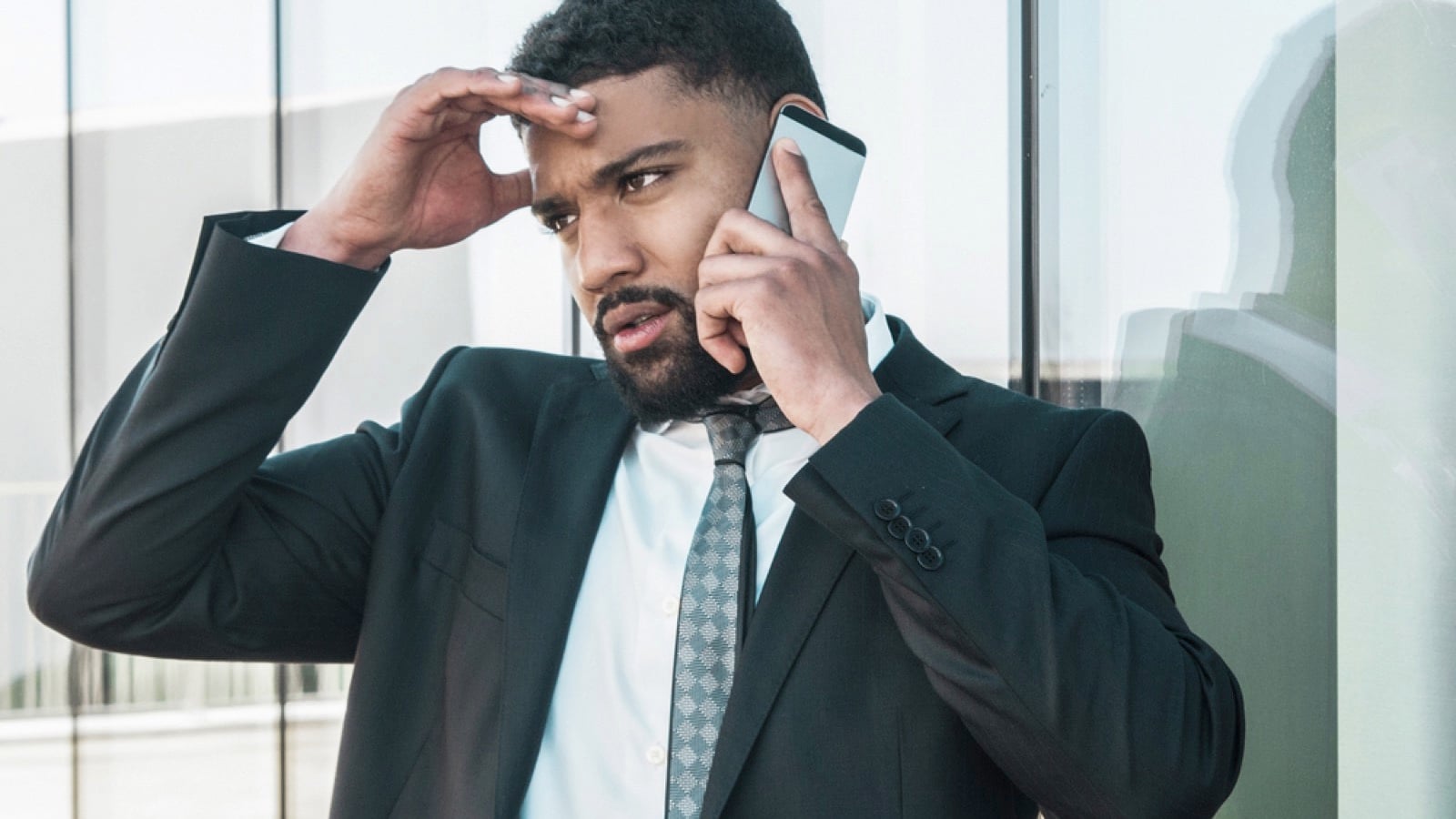 Businessman irritated in mobile