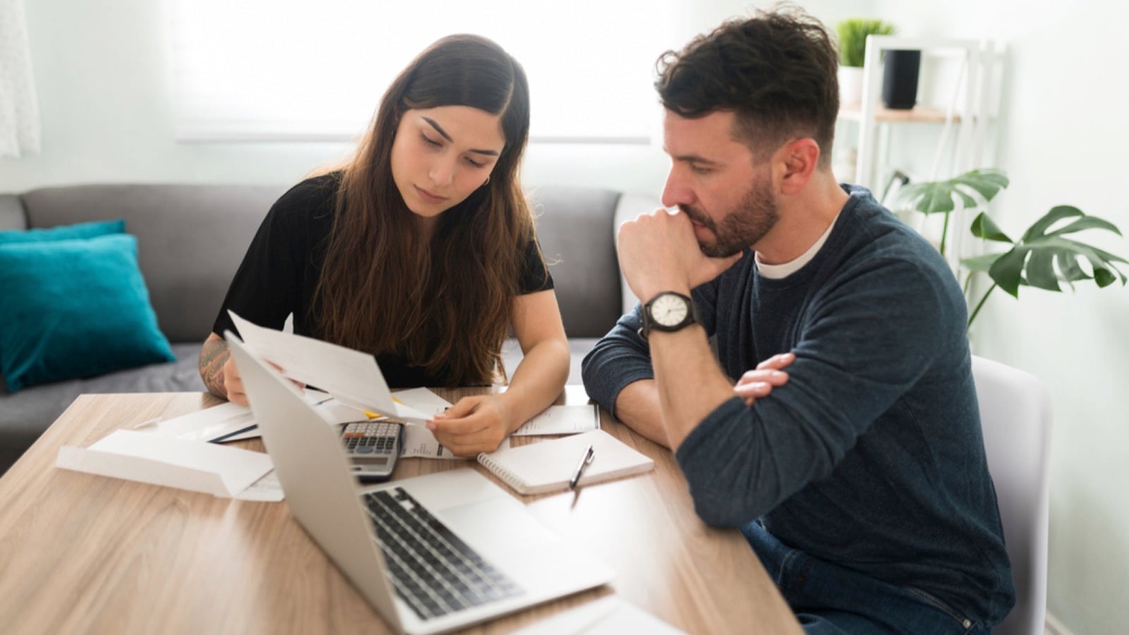 Couples discussing about monthly bills