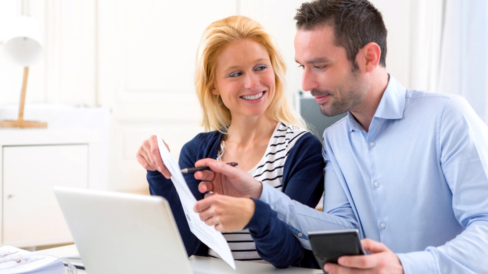 Couples talking about savings