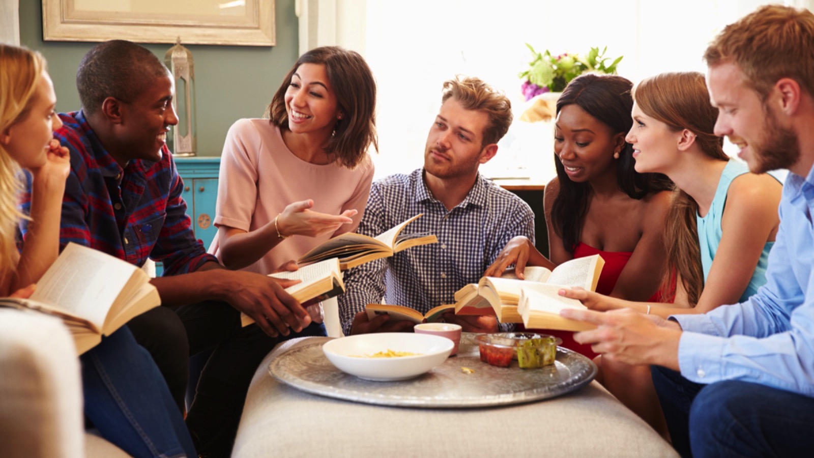 Group of friends talking and reviewing