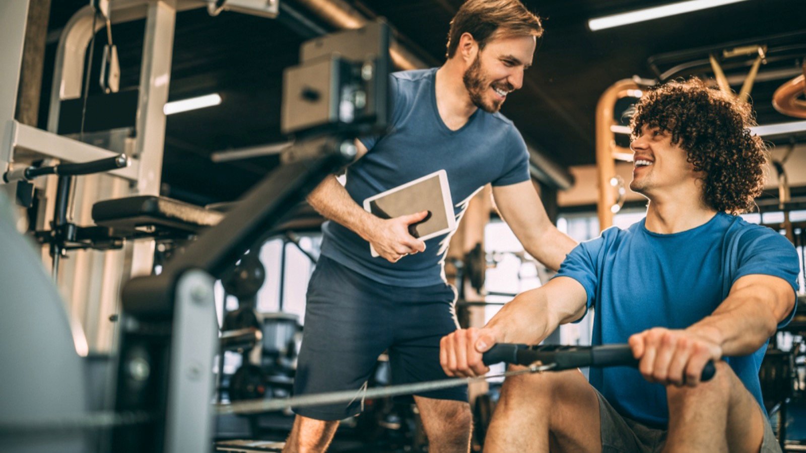 Gym instructor with friend