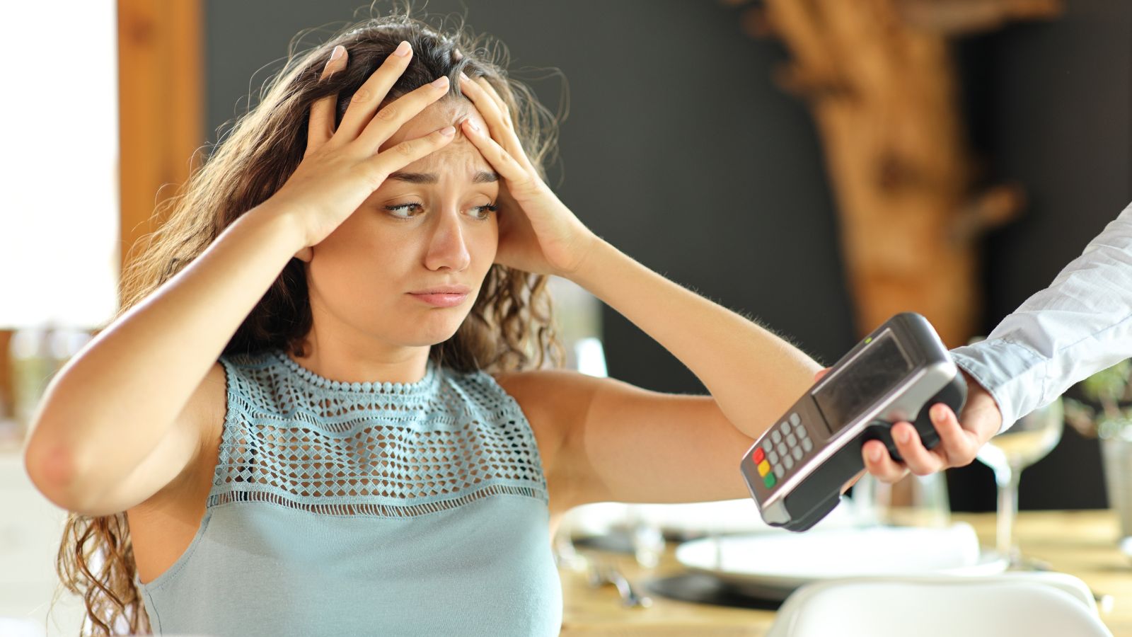 woman having trouble with bills