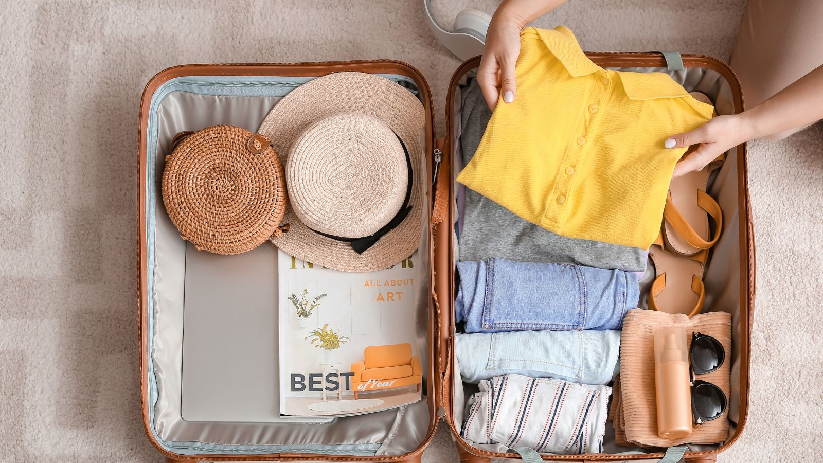 woman packing in her suitcase