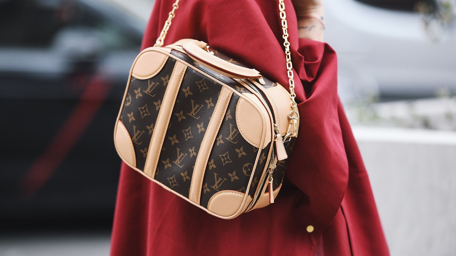 woman wearing louis vuitton bag