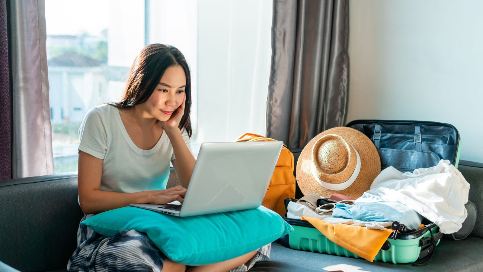 woman checking in her laptop