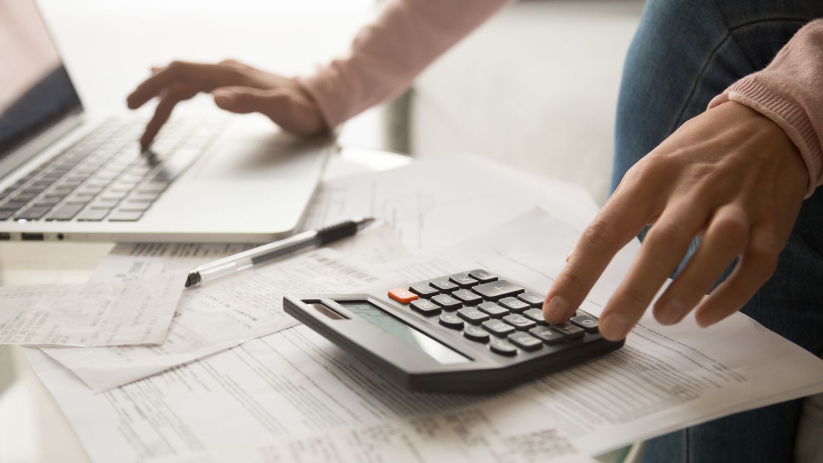 man computing his debt