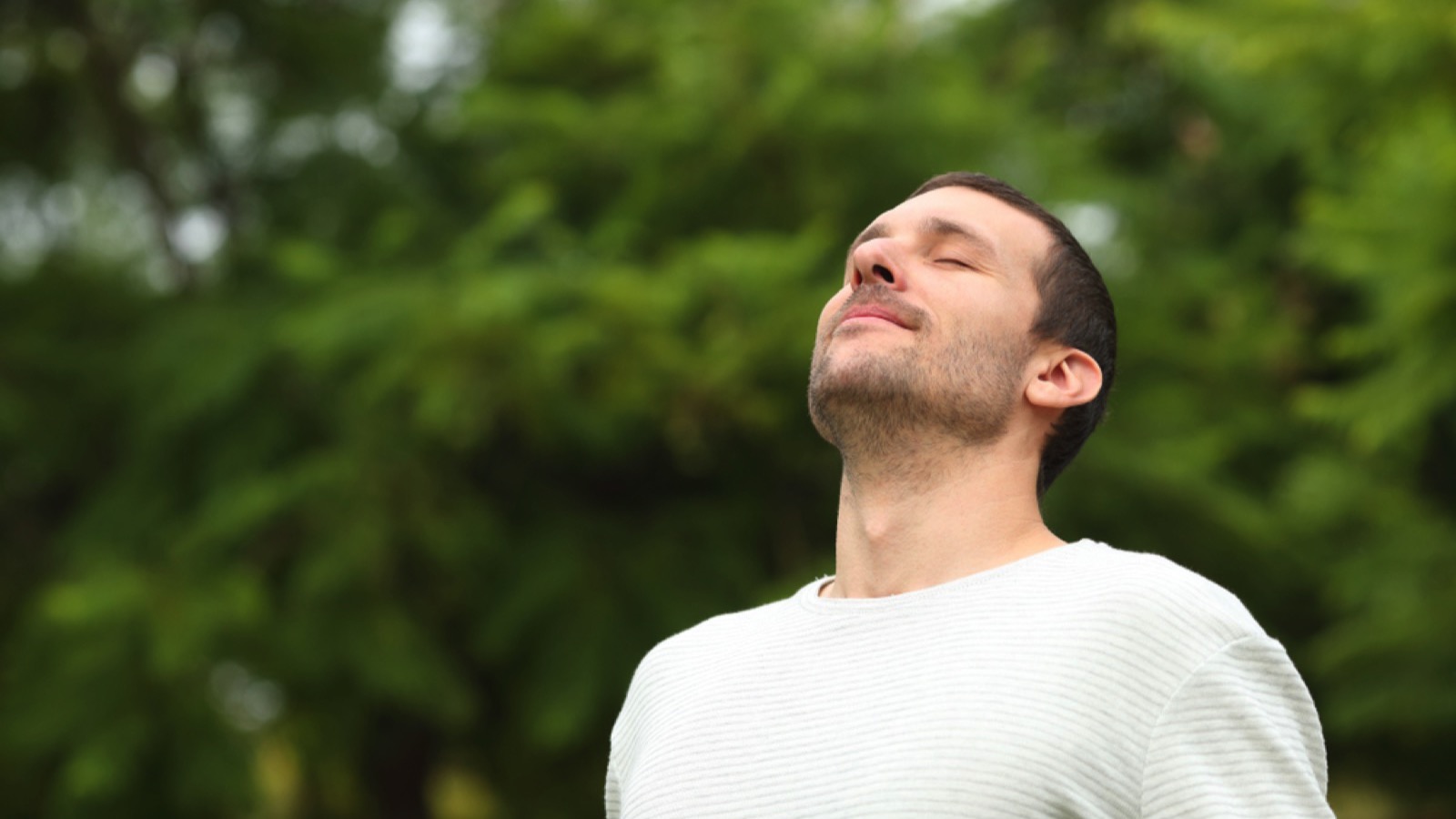 Man breathing inhaling air