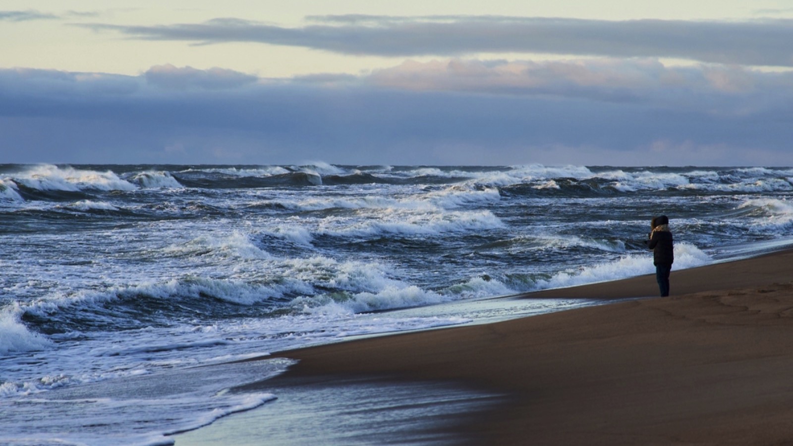 Man standing near high tide
