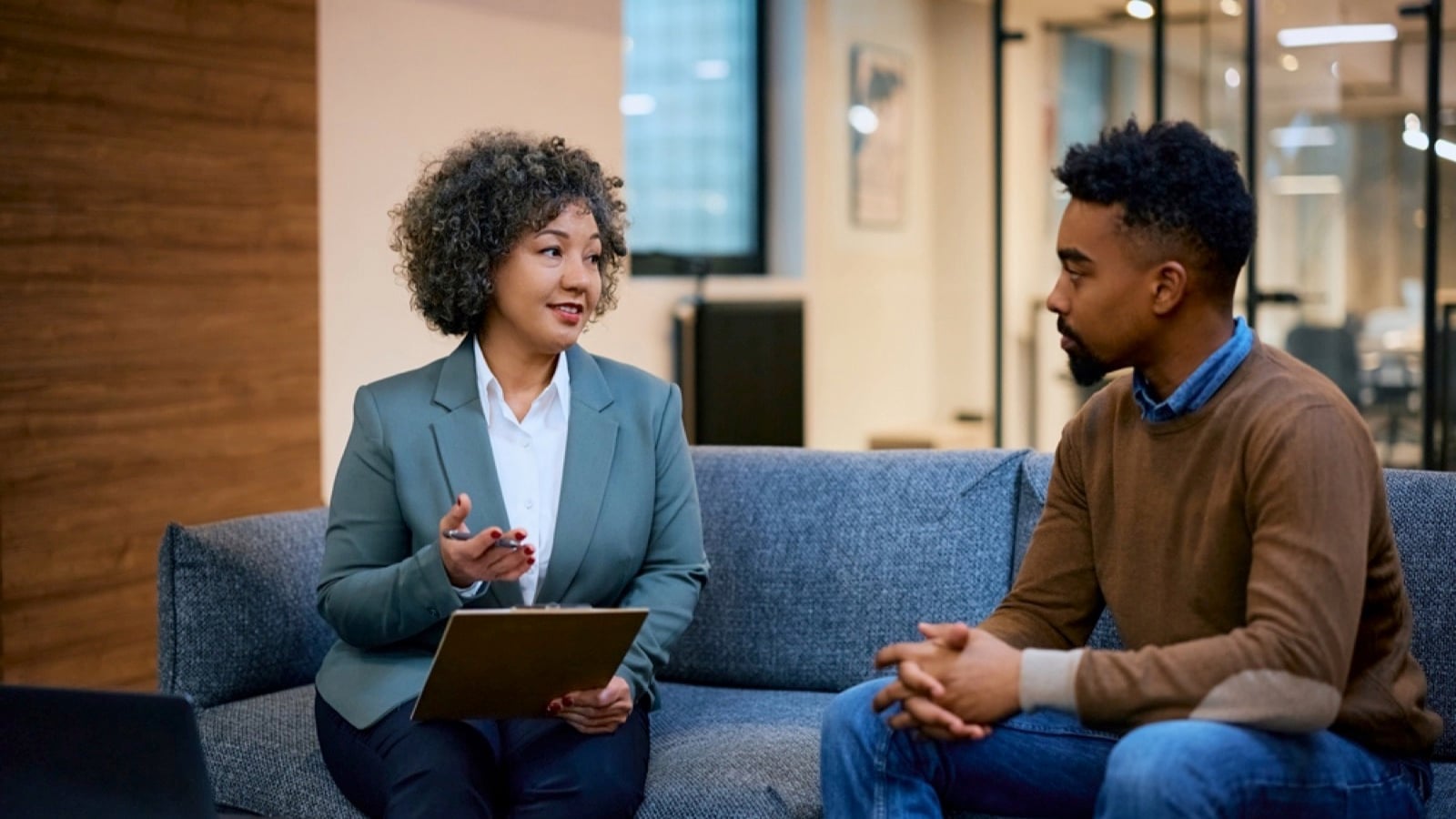 Man talking to bank manager