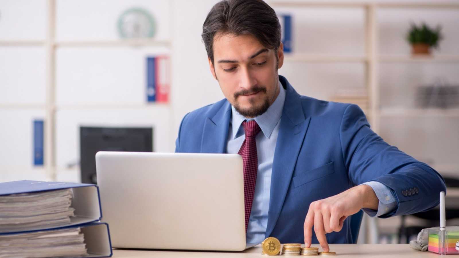 Man with crypto coins