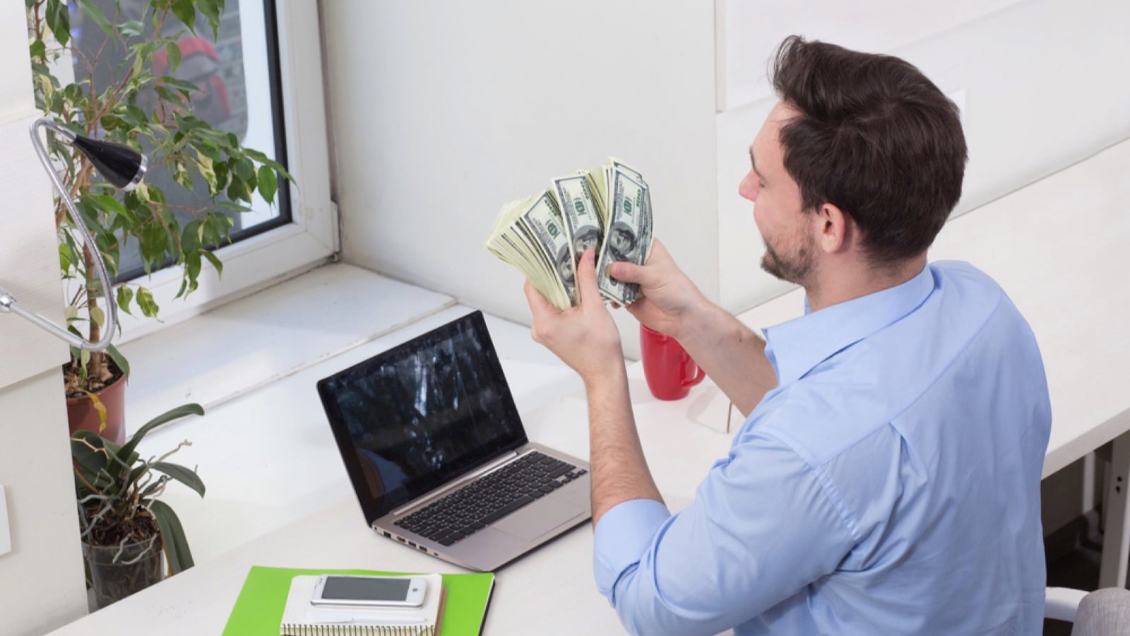 Man working and counting money