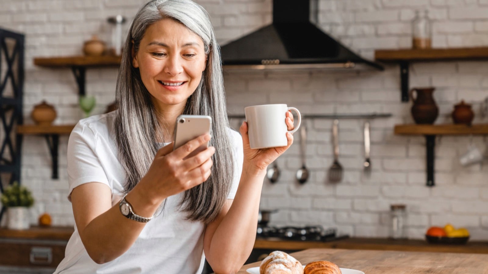 Middle aged woman using mobile