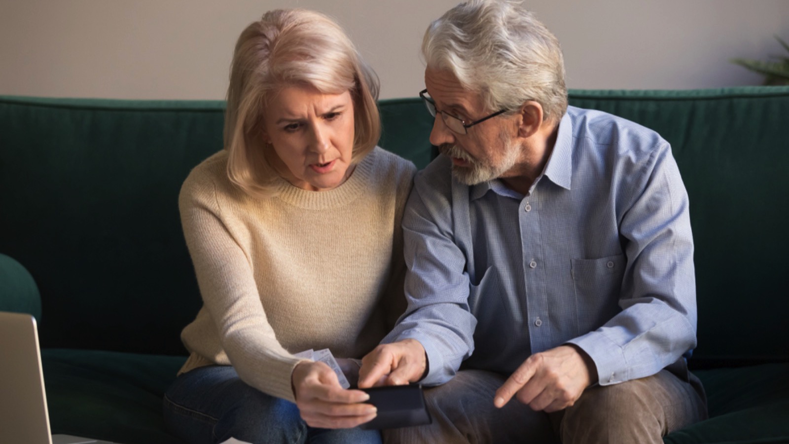 Old couple discussing about debt
