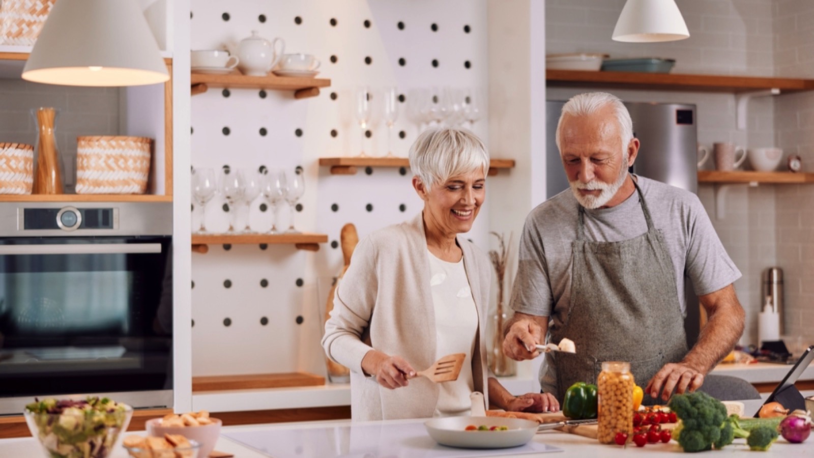 Old couples cooking