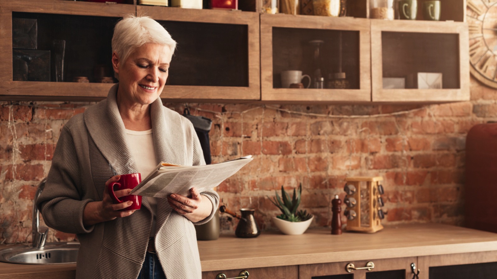Old woman having coffee