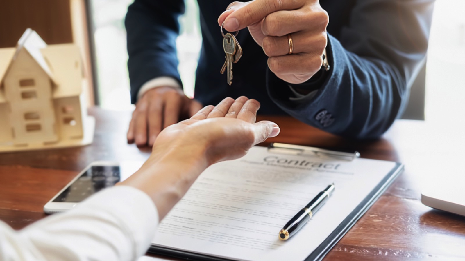 Real estate agent with contract