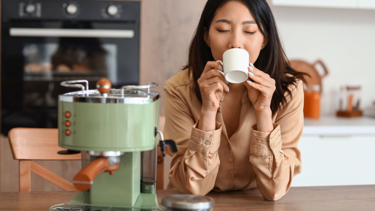 woman enjoying coffee at home