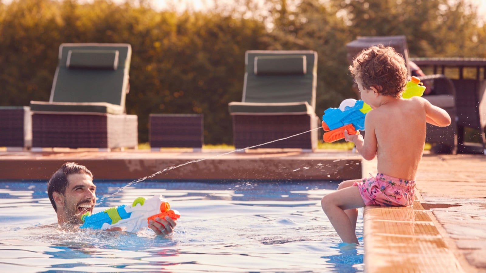 Man playing in swimming pool