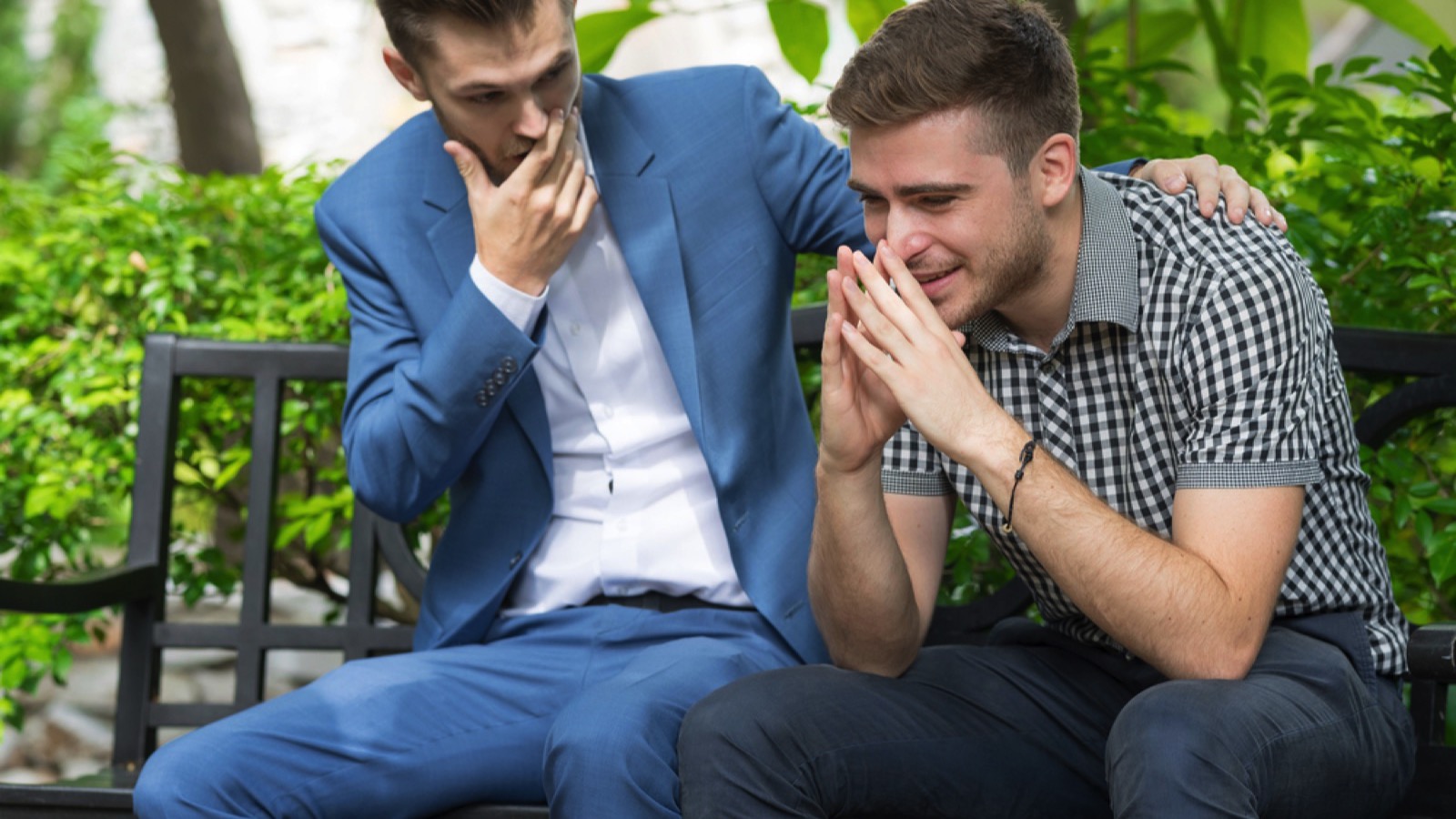 Teen boy comforting his friend