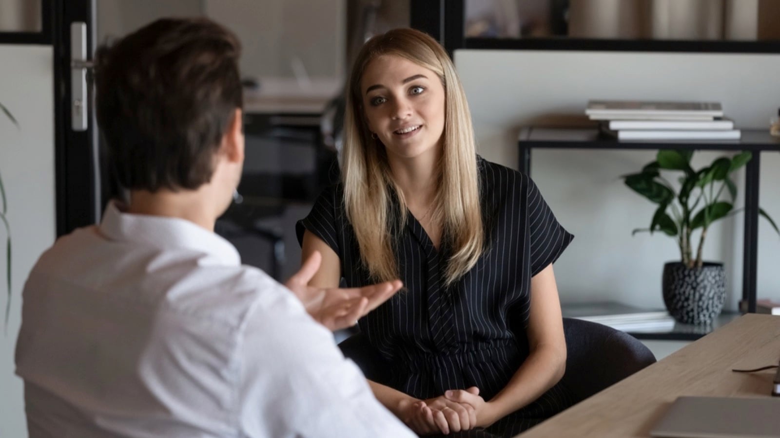Teen talking to manager