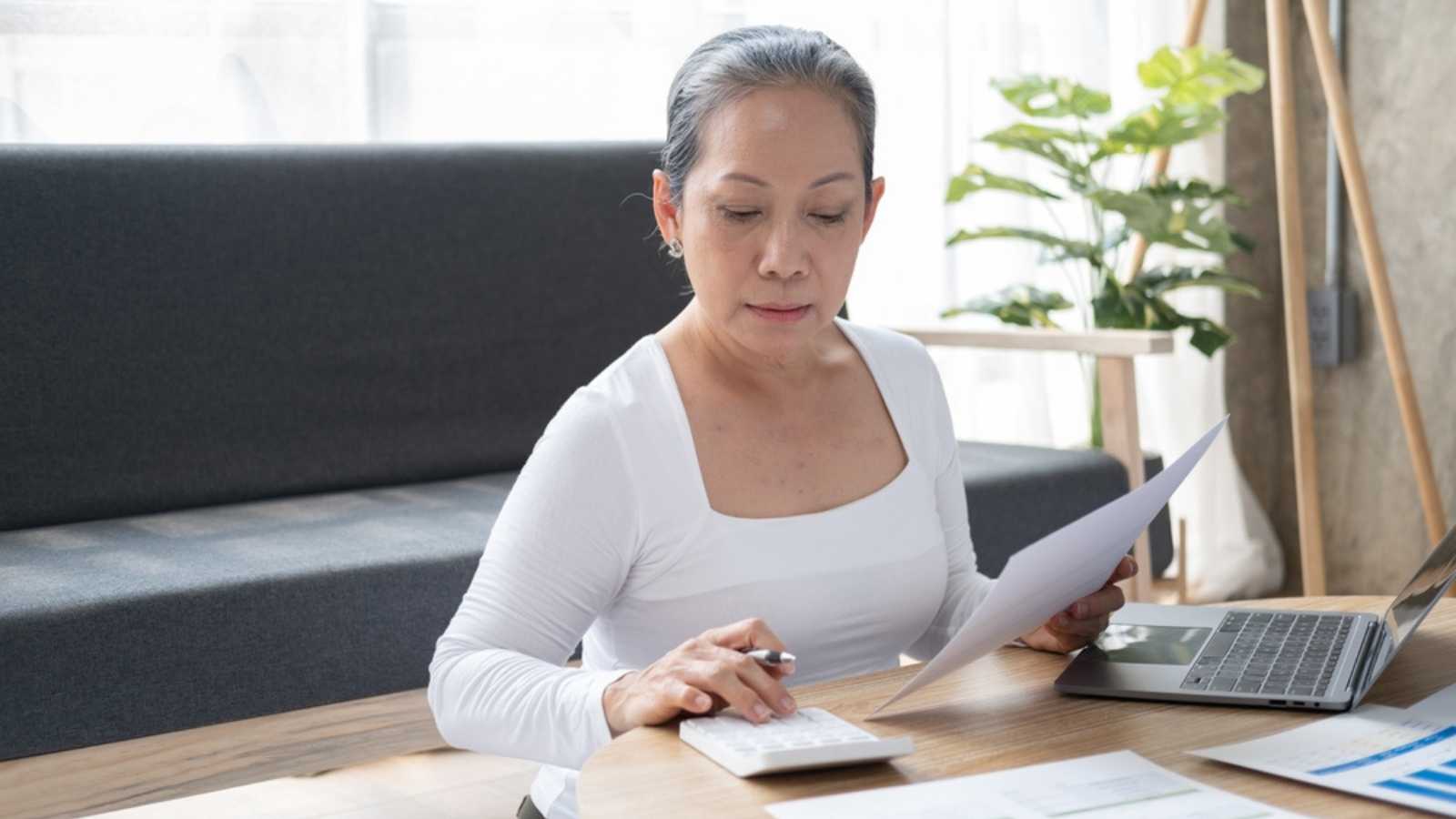 Woman assesing bills