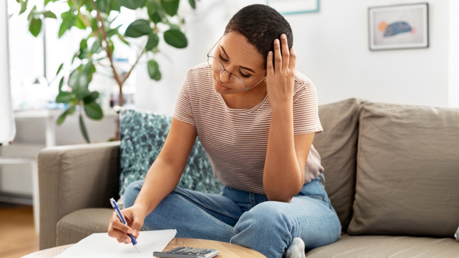 Woman calculating for savings