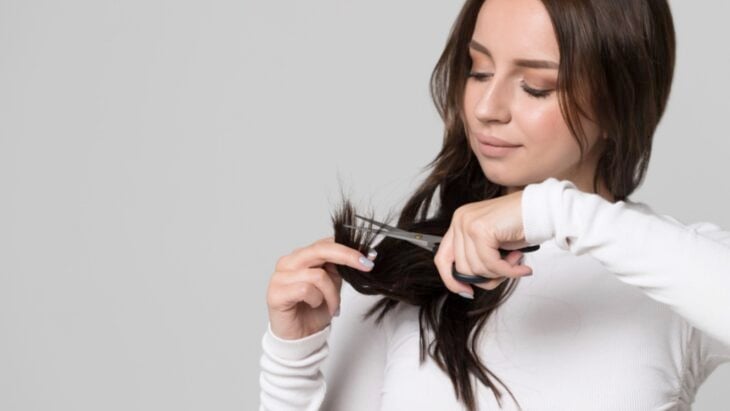 Woman doing hair cut