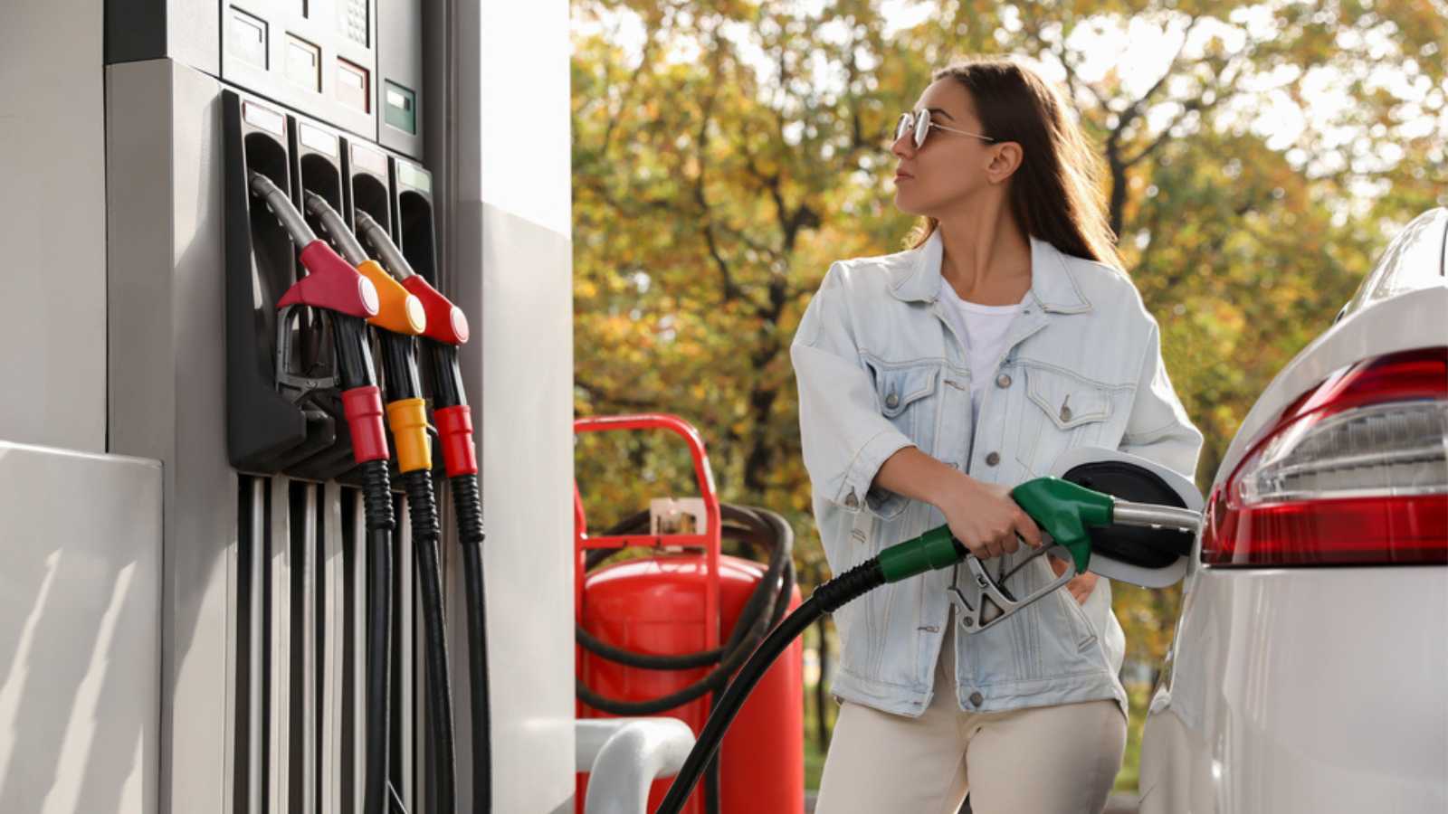 Woman filling gas tank