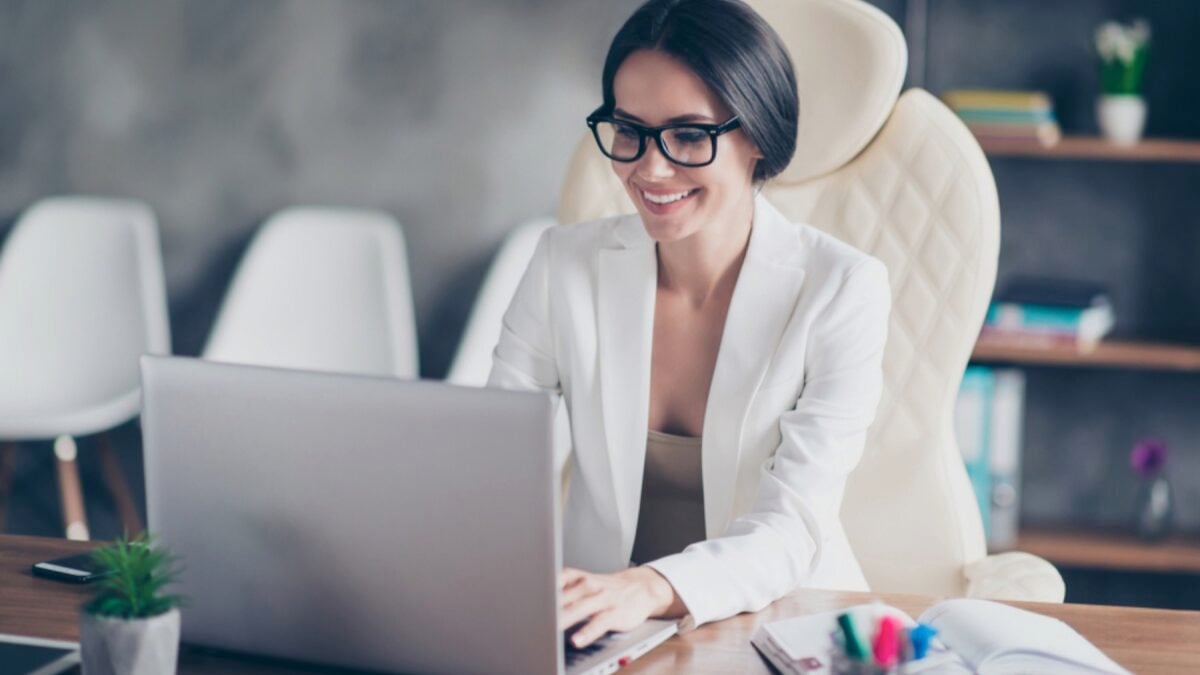 Woman siting in comfortable chair and working