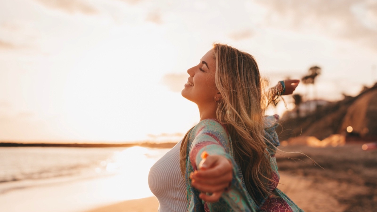 Woman standing in sunlight