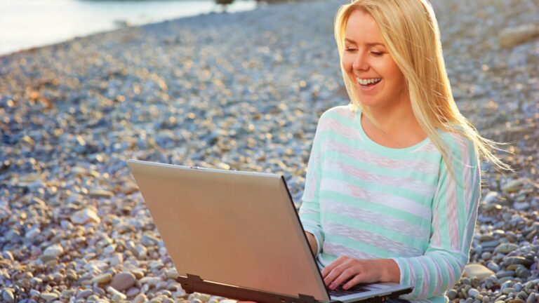Woman working in beach