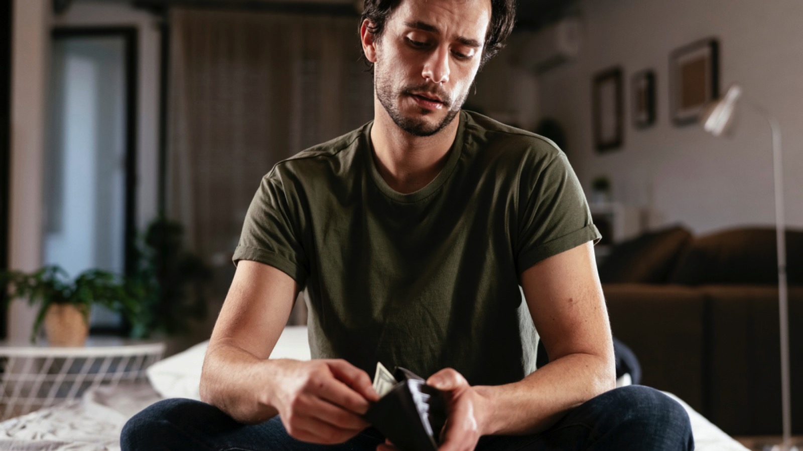 Young man checking money