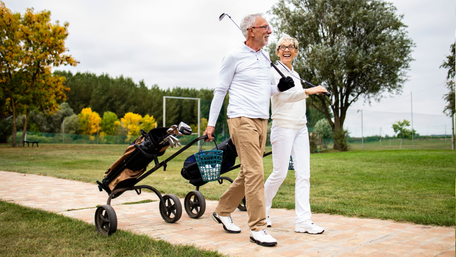retired person playing golf