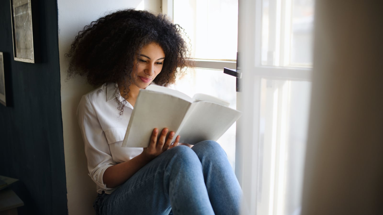 young woman reading a book