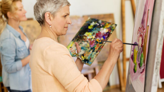 retired person painting