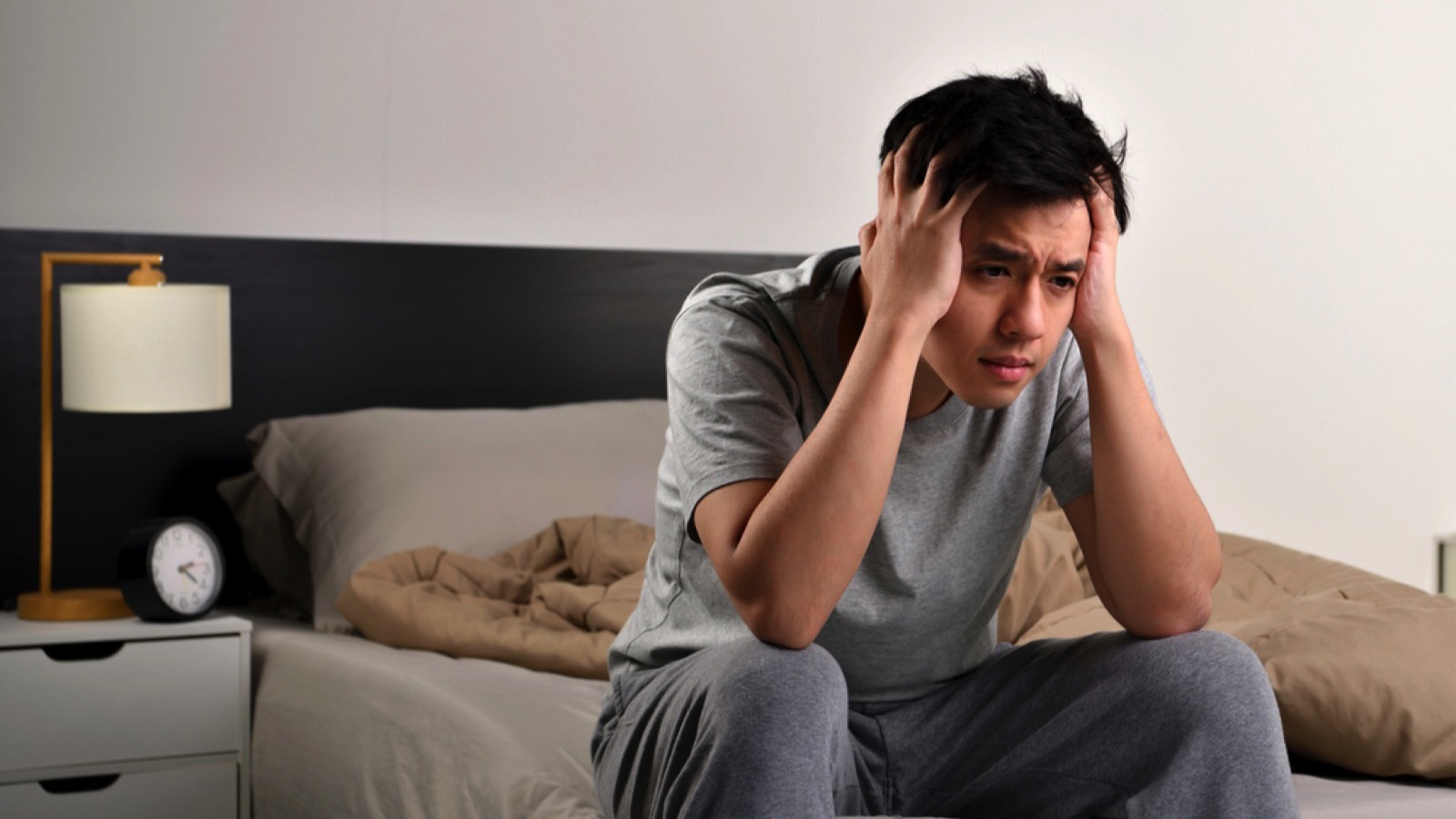 Depressed asian man
