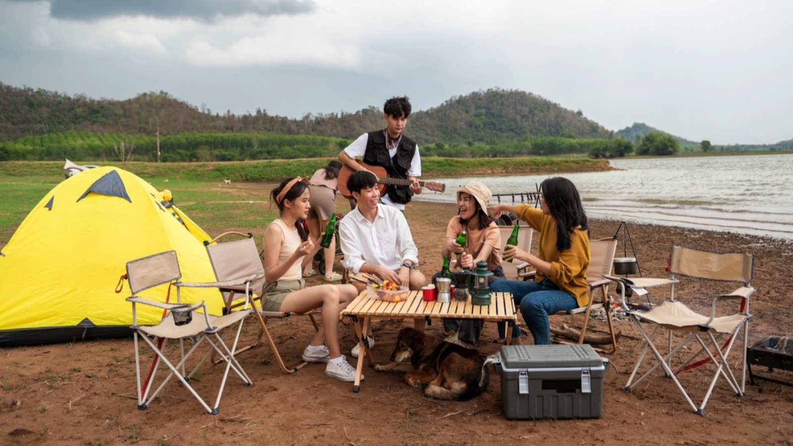 Group of asian people outside tent
