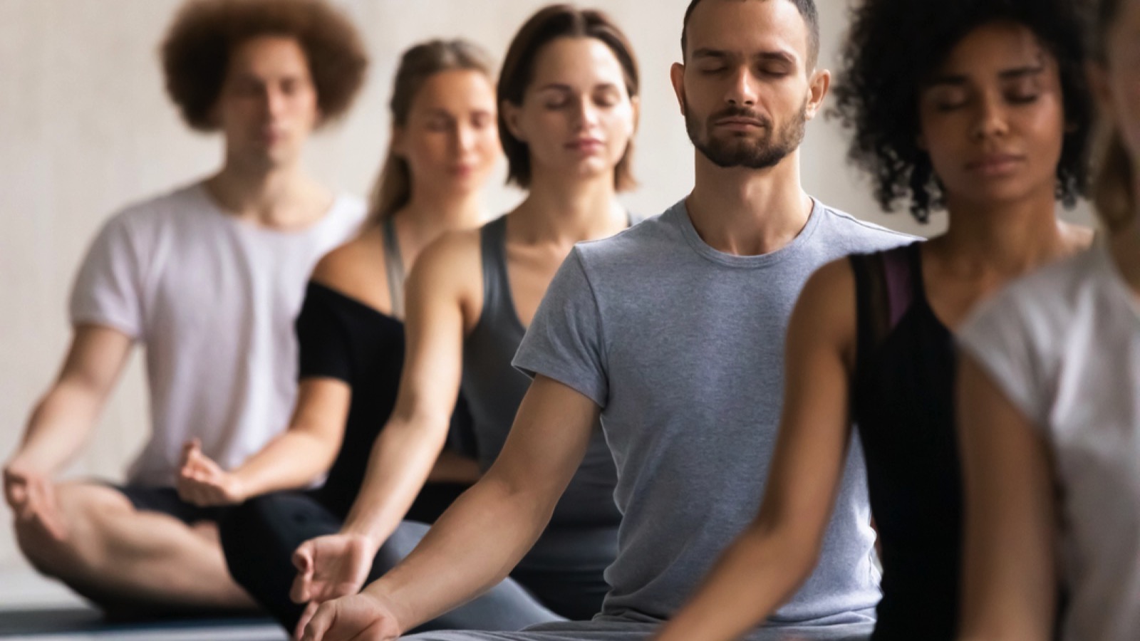 Group of people doing meditation sessions
