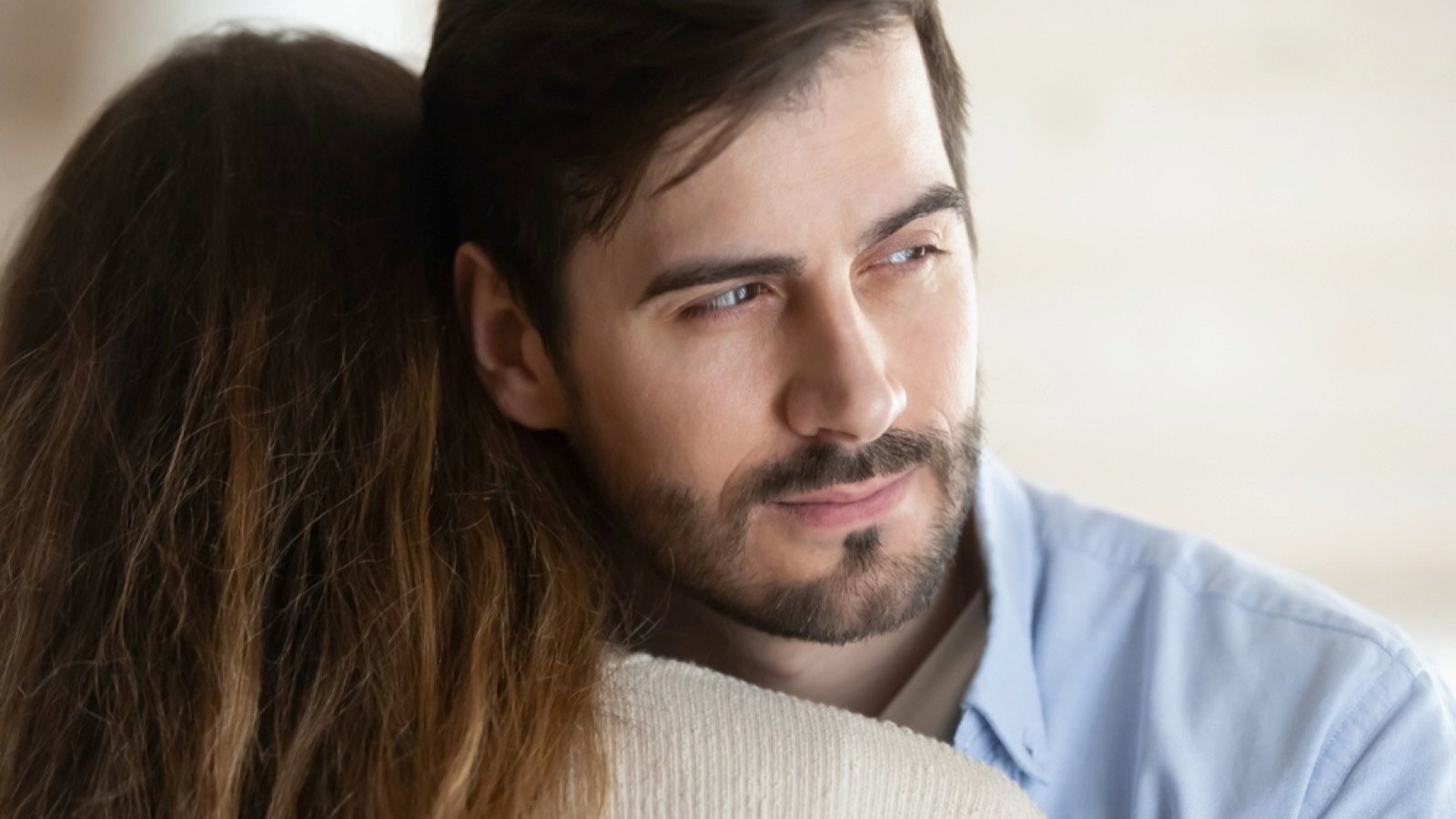 Handsome man lying to girlfriend