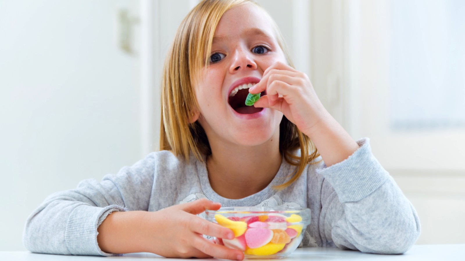 Kid eating candy