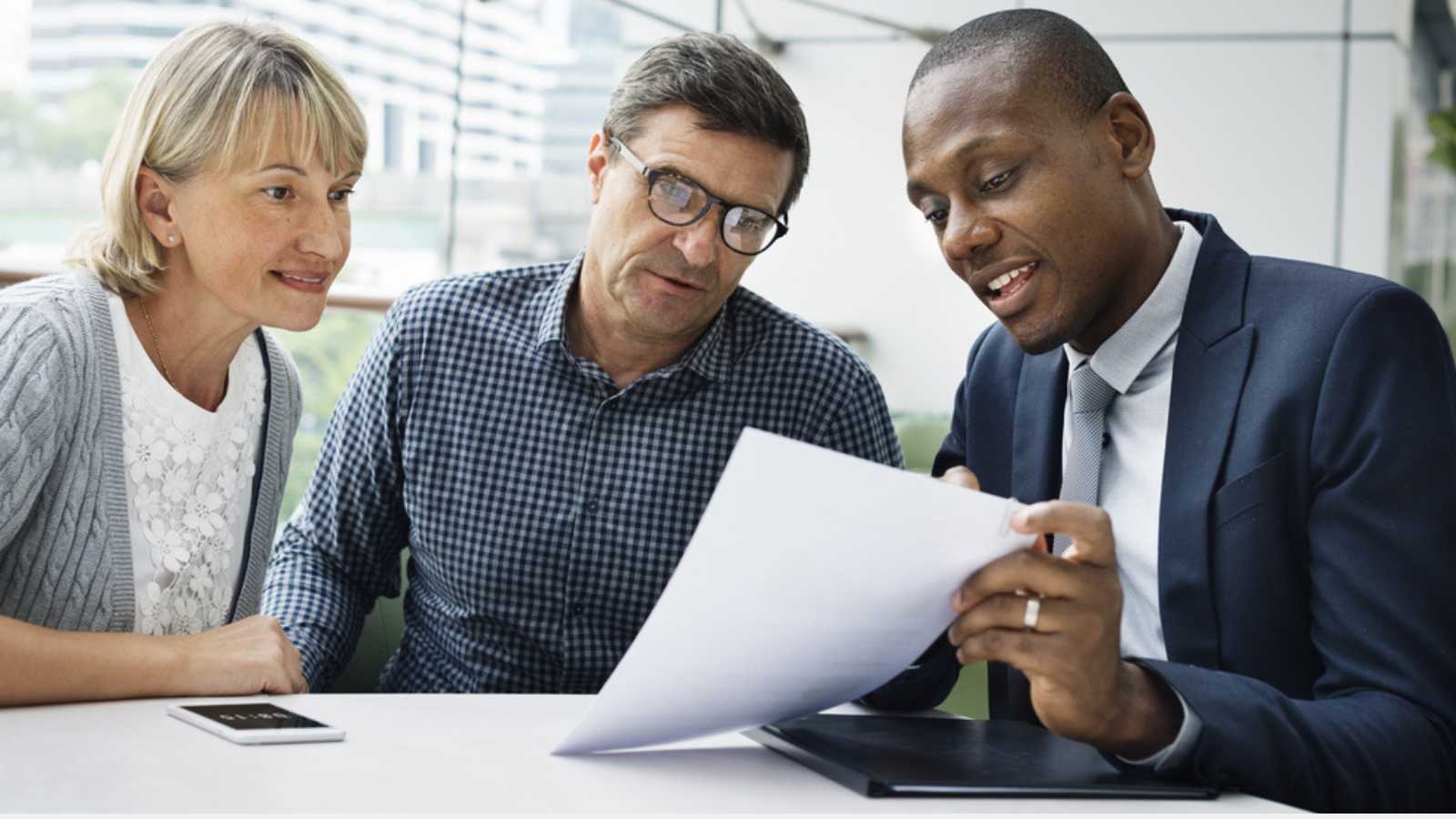 Old couples discussing with officer