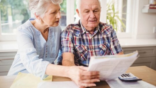 Senior couples discussing financial needs