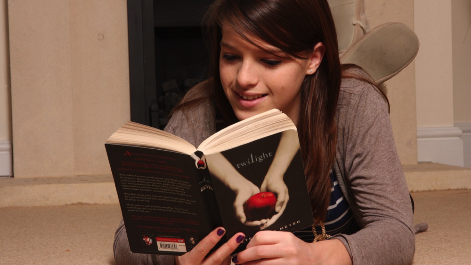 Teenager reading Twilight novel